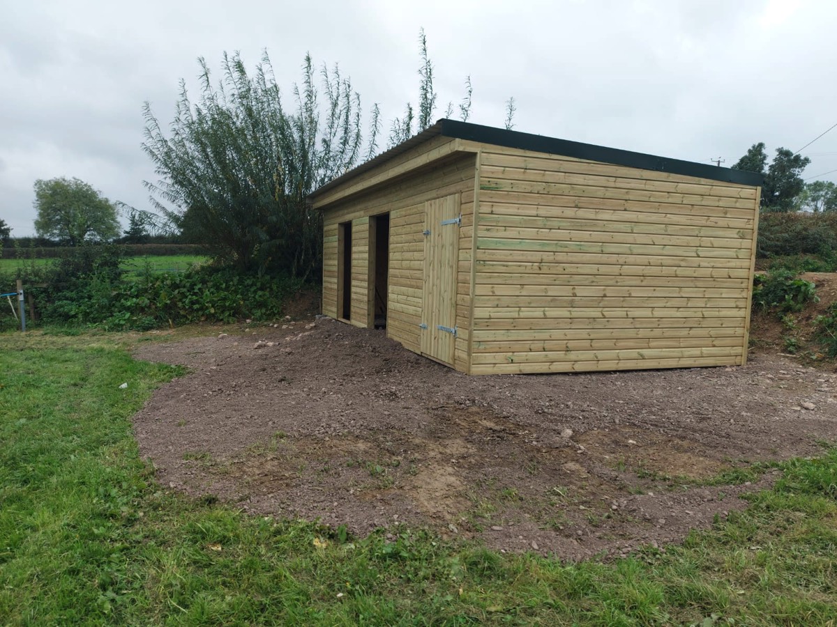 Completed wooden horse stables 